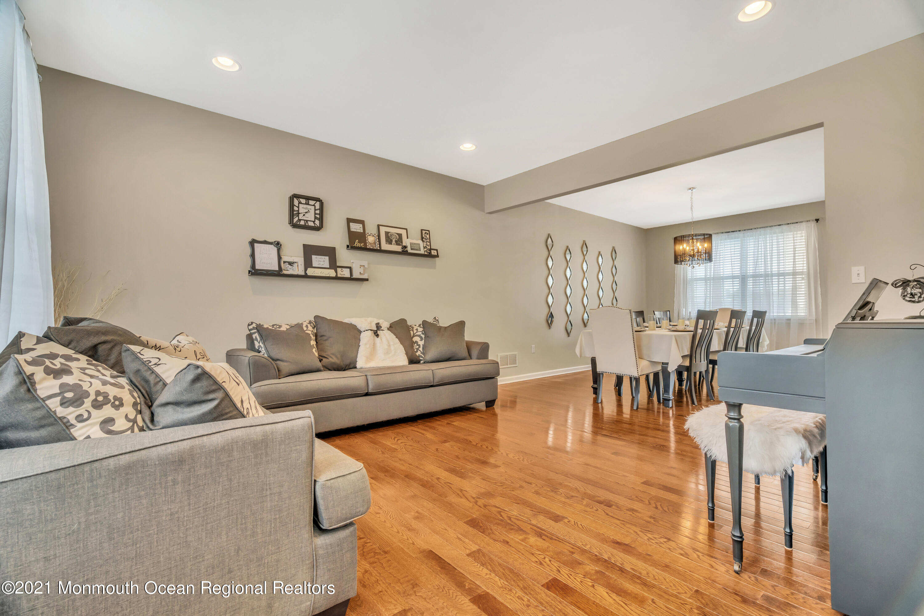 16 Bellagio Road Jackson, NJ 08527 - Photo 9 of 46 a living room with furniture and a table
