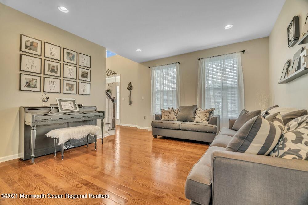 16 Bellagio Road Jackson, NJ 08527 - Photo 10 of 46 a living room with furniture and a window