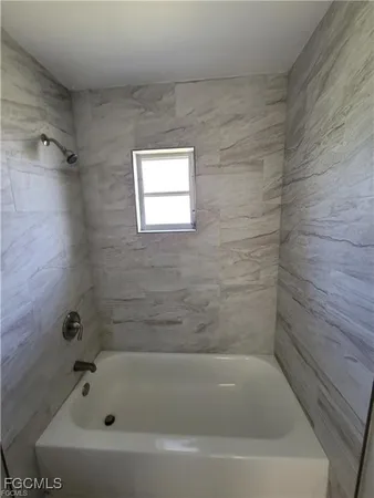 a bathroom with a bathtub