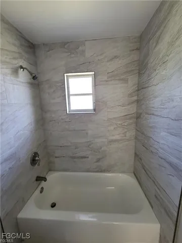 a bathroom with a bathtub