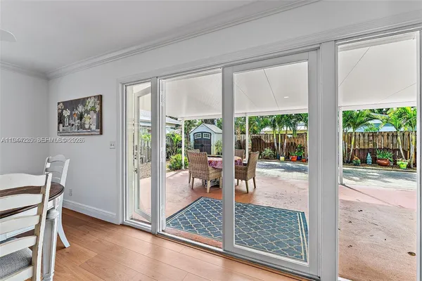 a view of a living room and a window
