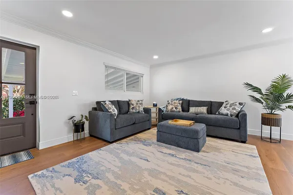 a living room with furniture and a couch