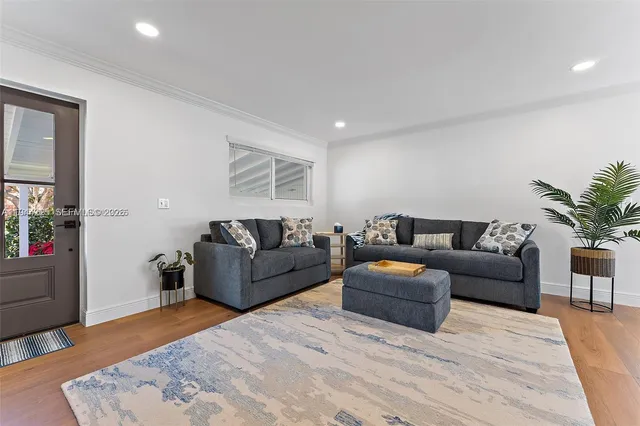 a living room with furniture and a couch