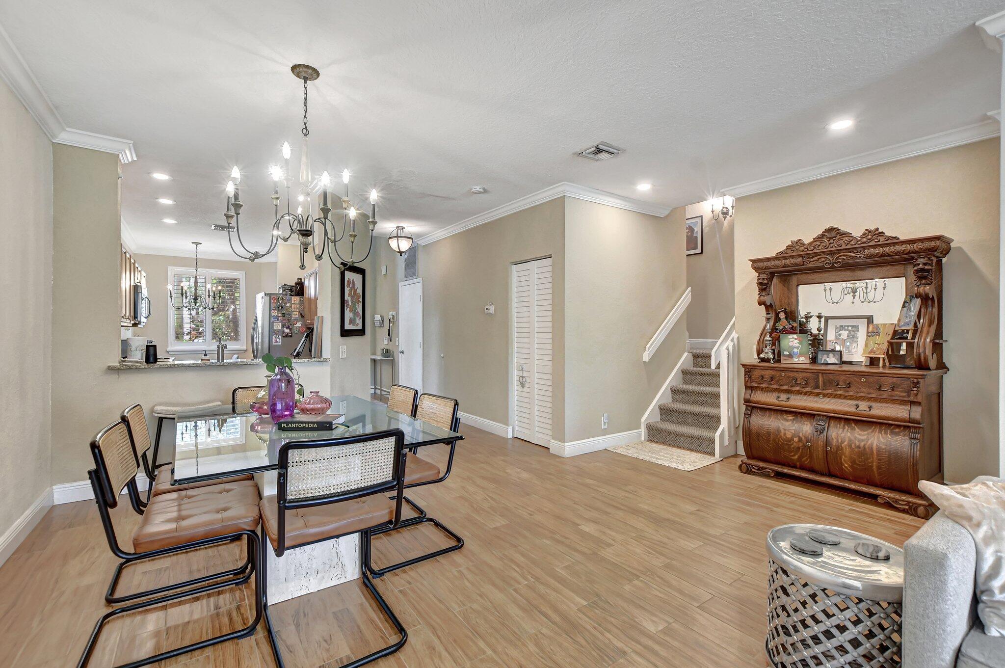 6682 Via Regina Boca Raton, FL 33433 - Photo 25 of 46 a living room with furniture and a wooden floor