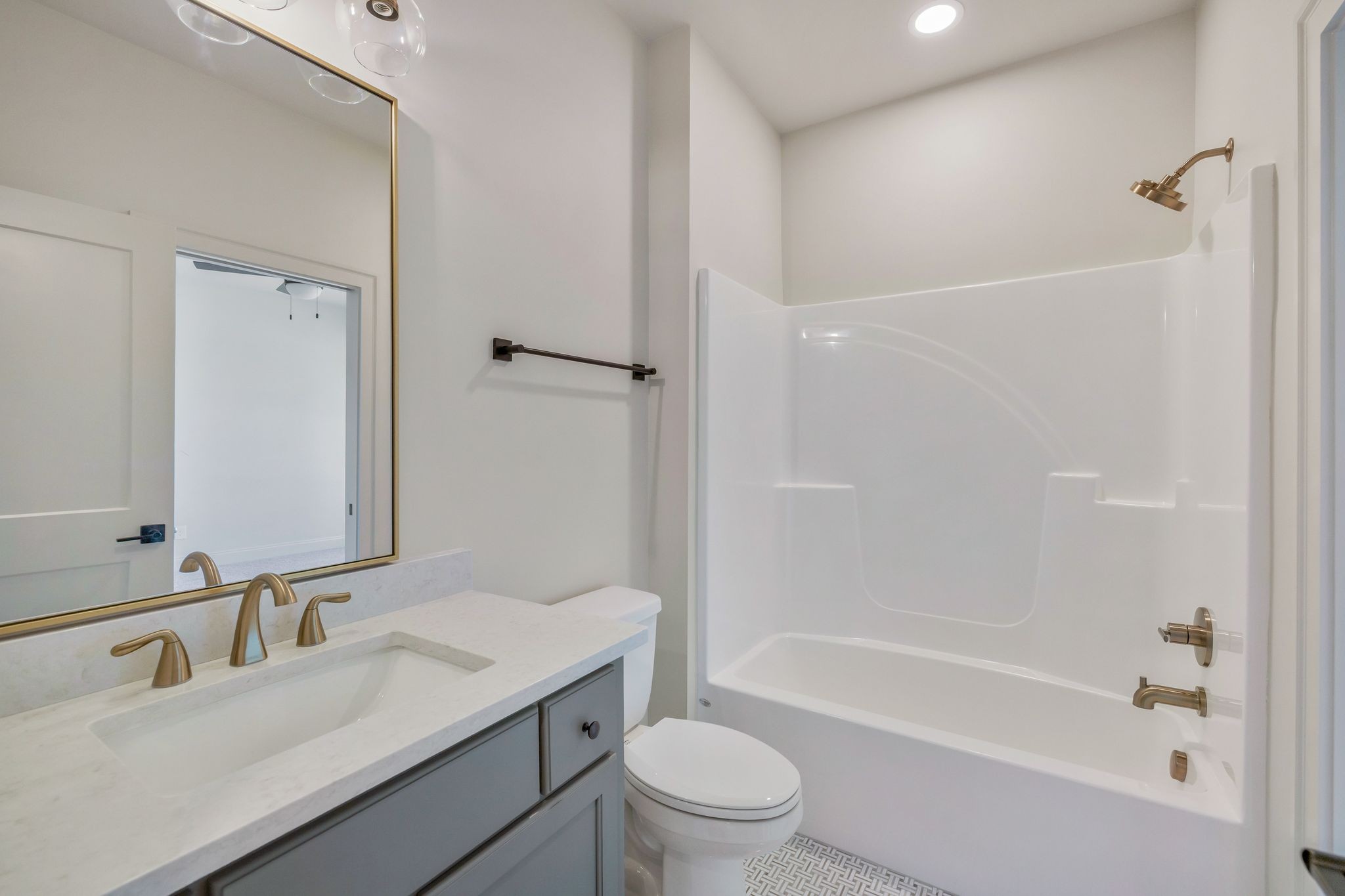 5548 Sinclair Street Murfreesboro, TN 37127 - Photo 12 of 58 a bathroom with a bathtub shower sink vanity mirror and toilet