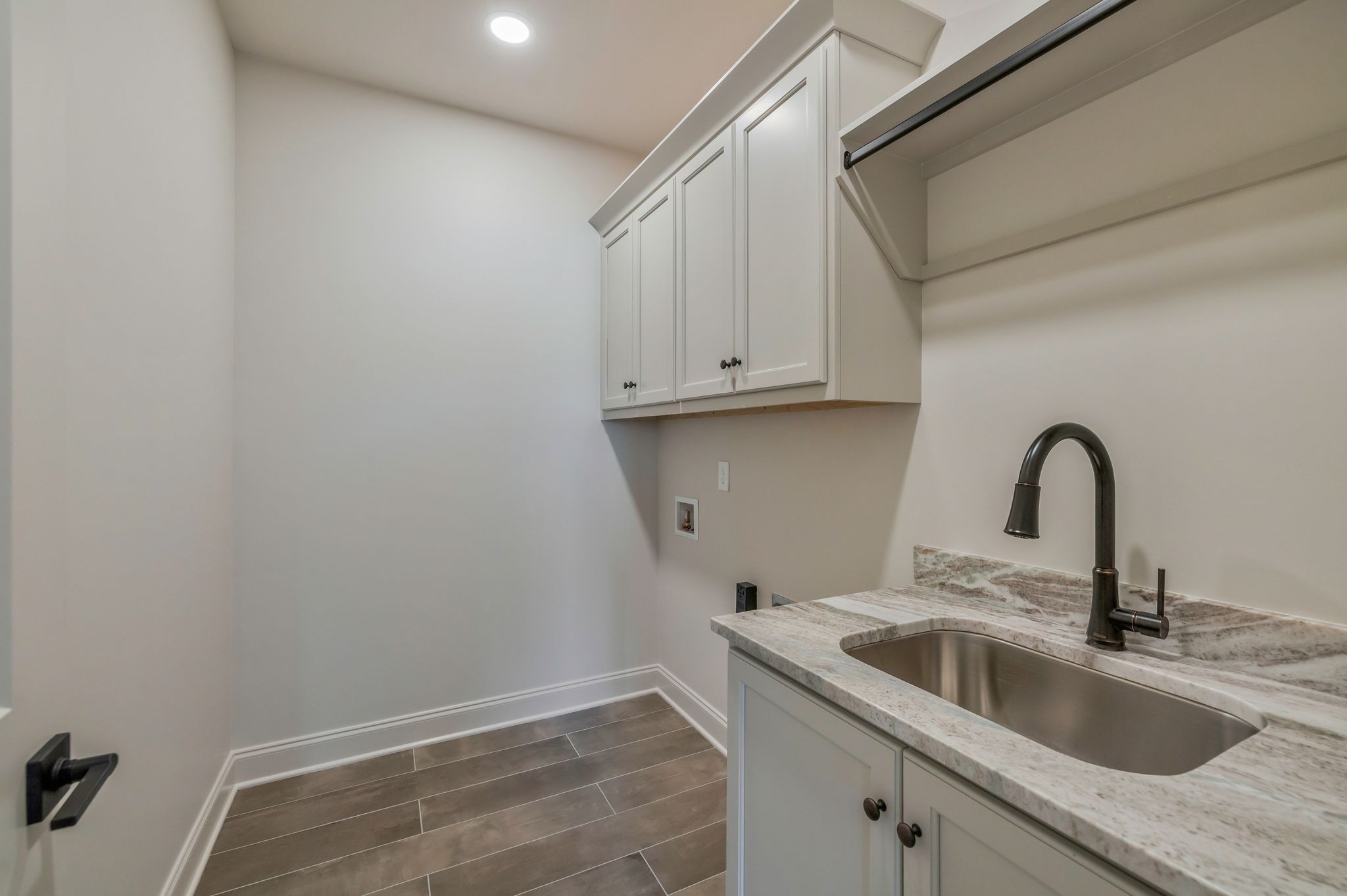 5548 Sinclair Street Murfreesboro, TN 37127 - Photo 13 of 58 a kitchen with a sink and cabinets