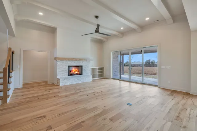 a bathroom with a double vanity sink mirror and shower