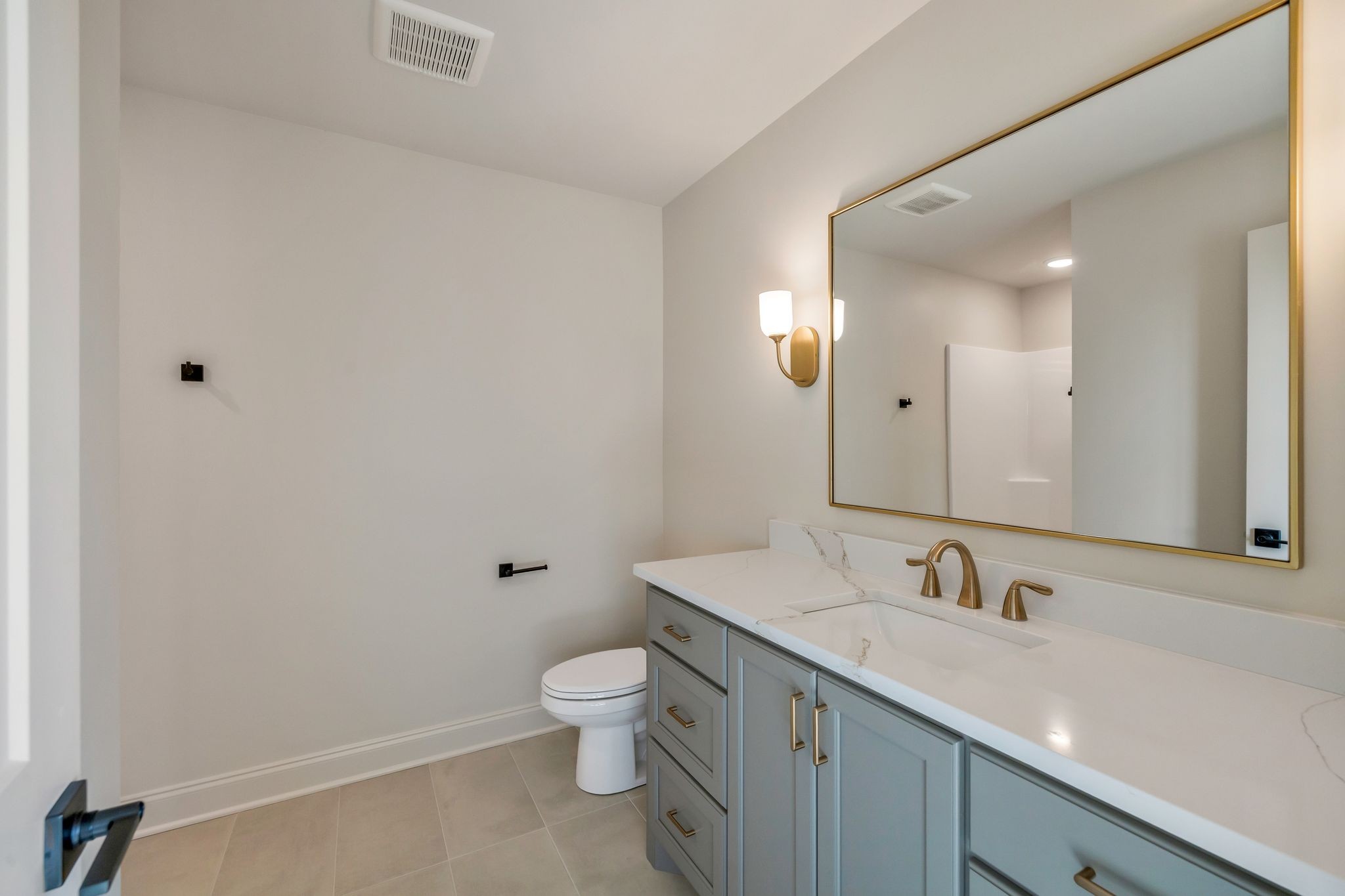 5548 Sinclair Street Murfreesboro, TN 37127 - Photo 39 of 58 a bathroom with a sink mirror and toilet