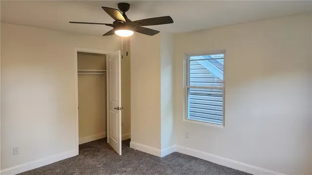 an empty room with a bathroom