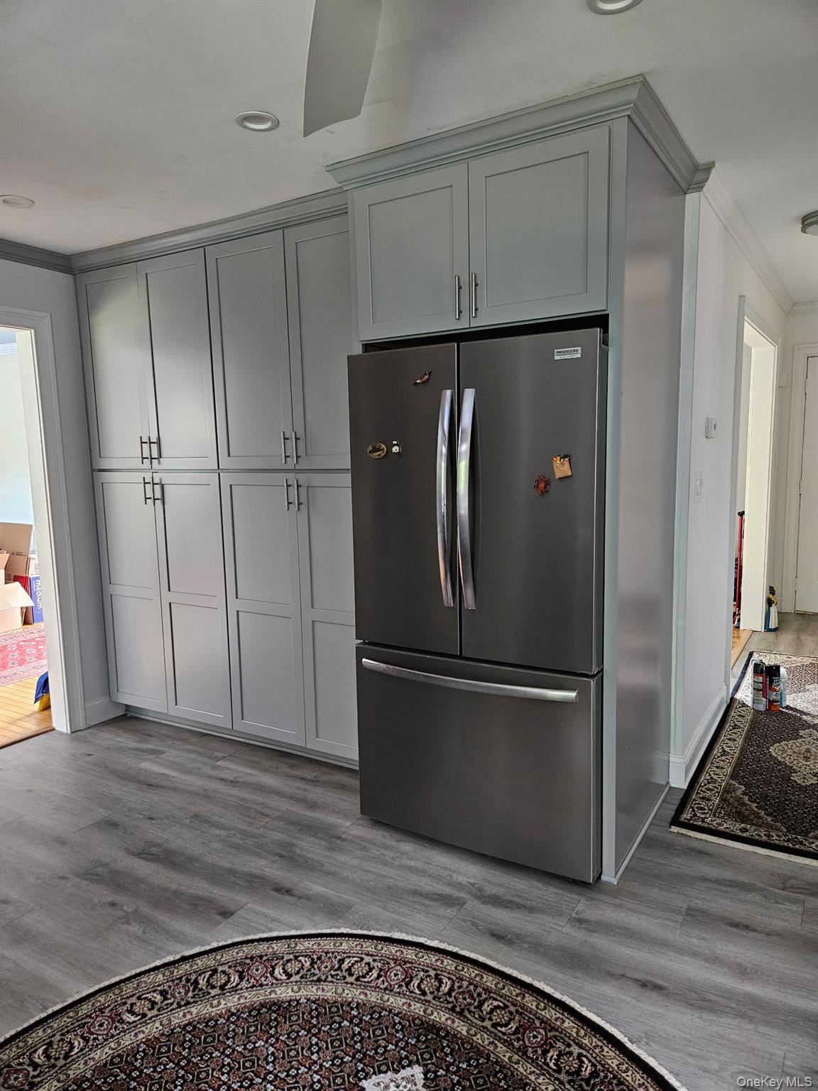 25 Lenape Road Newburgh, NY 12550 - Photo 5 of 35 a metallic refrigerator freezer sitting in a kitchen