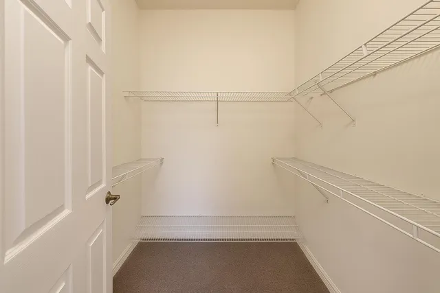 a view of a room with racks on the wall