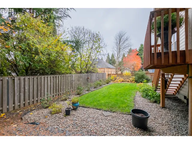 a backyard of a house with lots of green space
