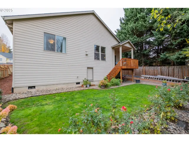 a view of backyard with deck