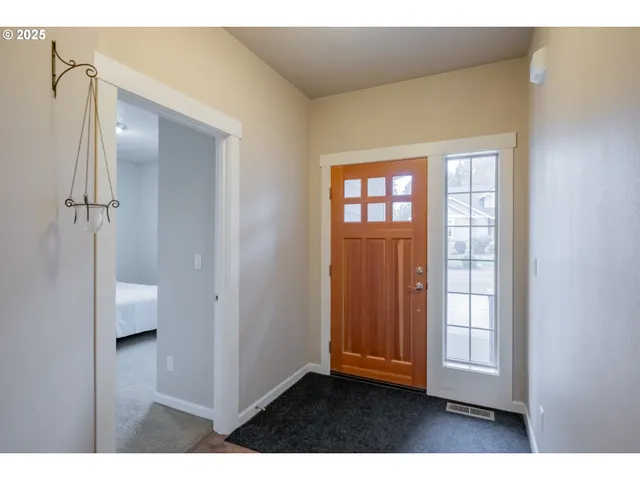 a view interior of a house with wooden floor and windows