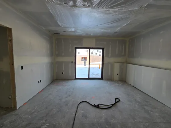 an empty room with windows