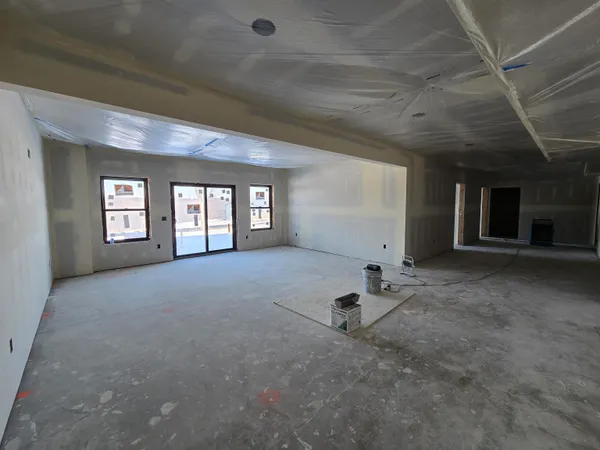 a view of empty room with windows