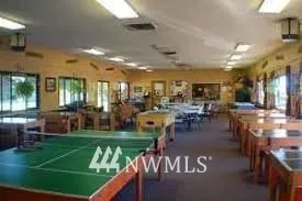 a kitchen with a stove and a refrigerator