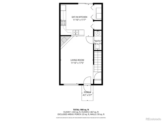 a picture of a bench in front of a wall