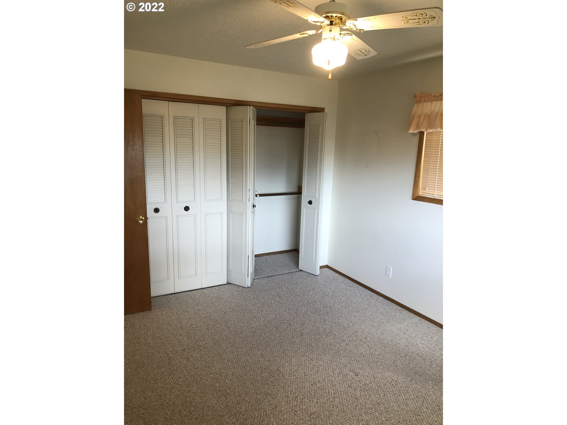 2806 Southwest Goodwin Avenue Pendleton, OR 97801 - Photo 20 of 32 a view of an empty room with a ceiling fan