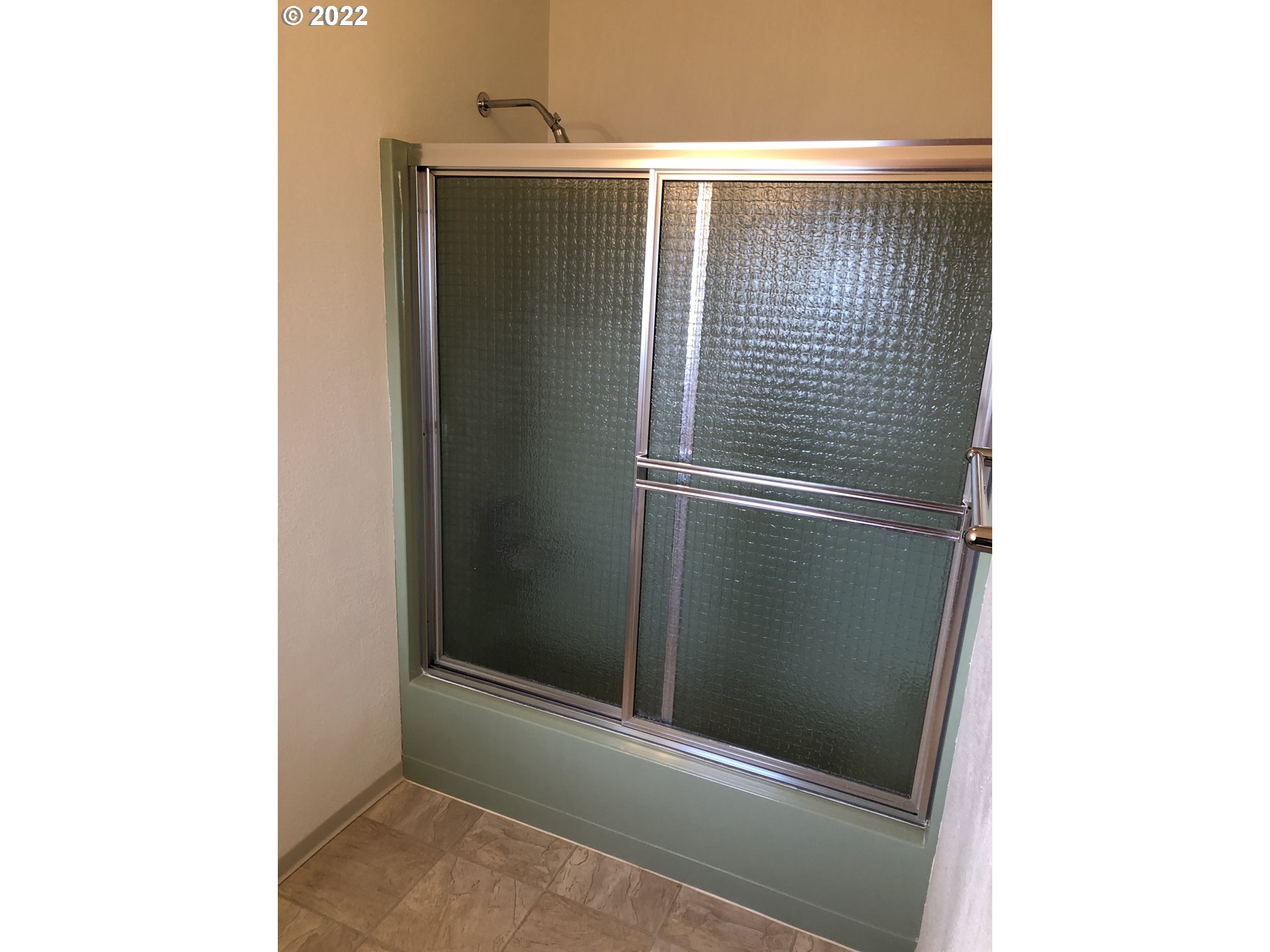 2806 Southwest Goodwin Avenue Pendleton, OR 97801 - Photo 21 of 32 a bathroom with a door