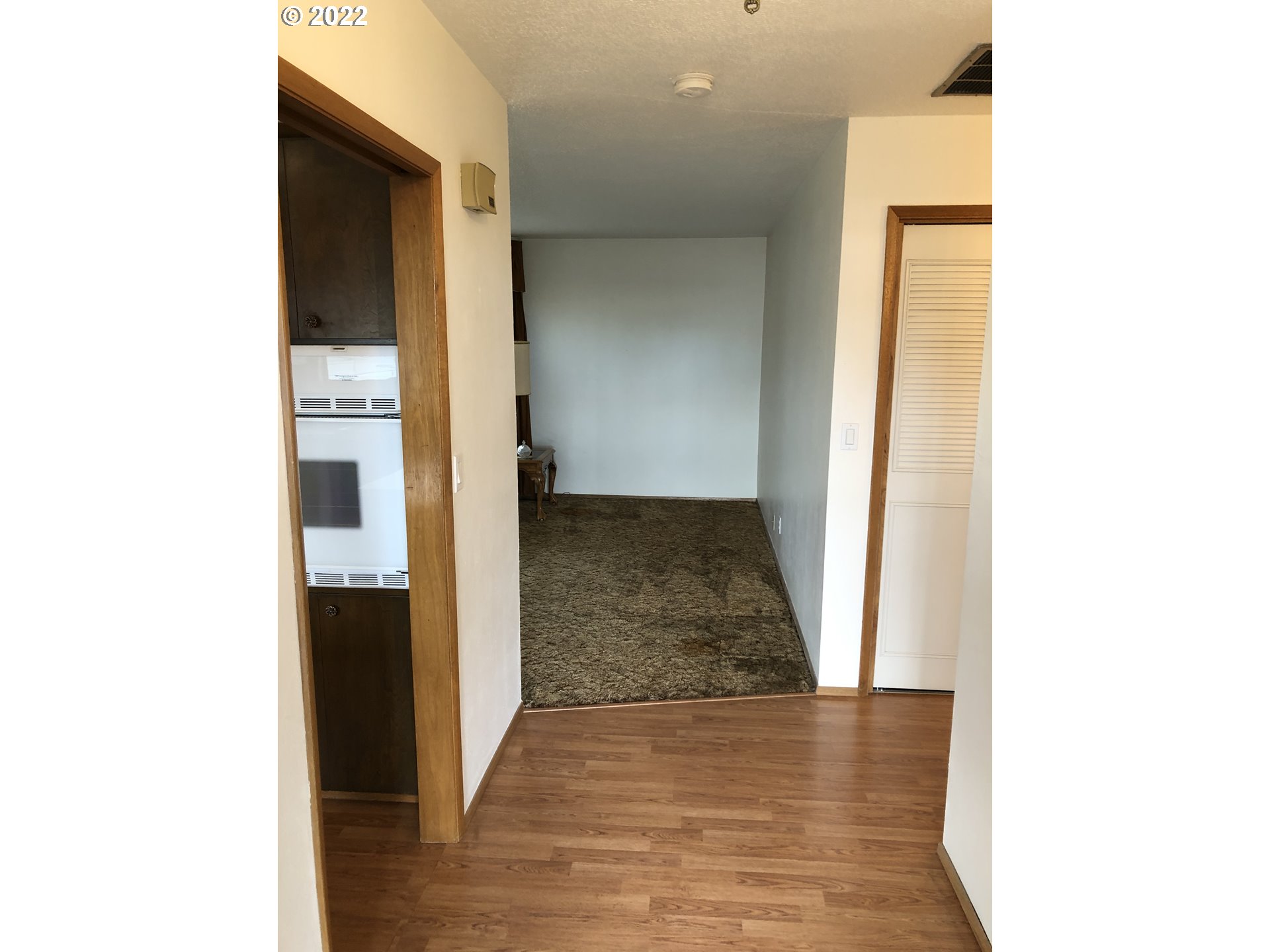 2806 Southwest Goodwin Avenue Pendleton, OR 97801 - Photo 4 of 32 a view of a hallway with wooden floor