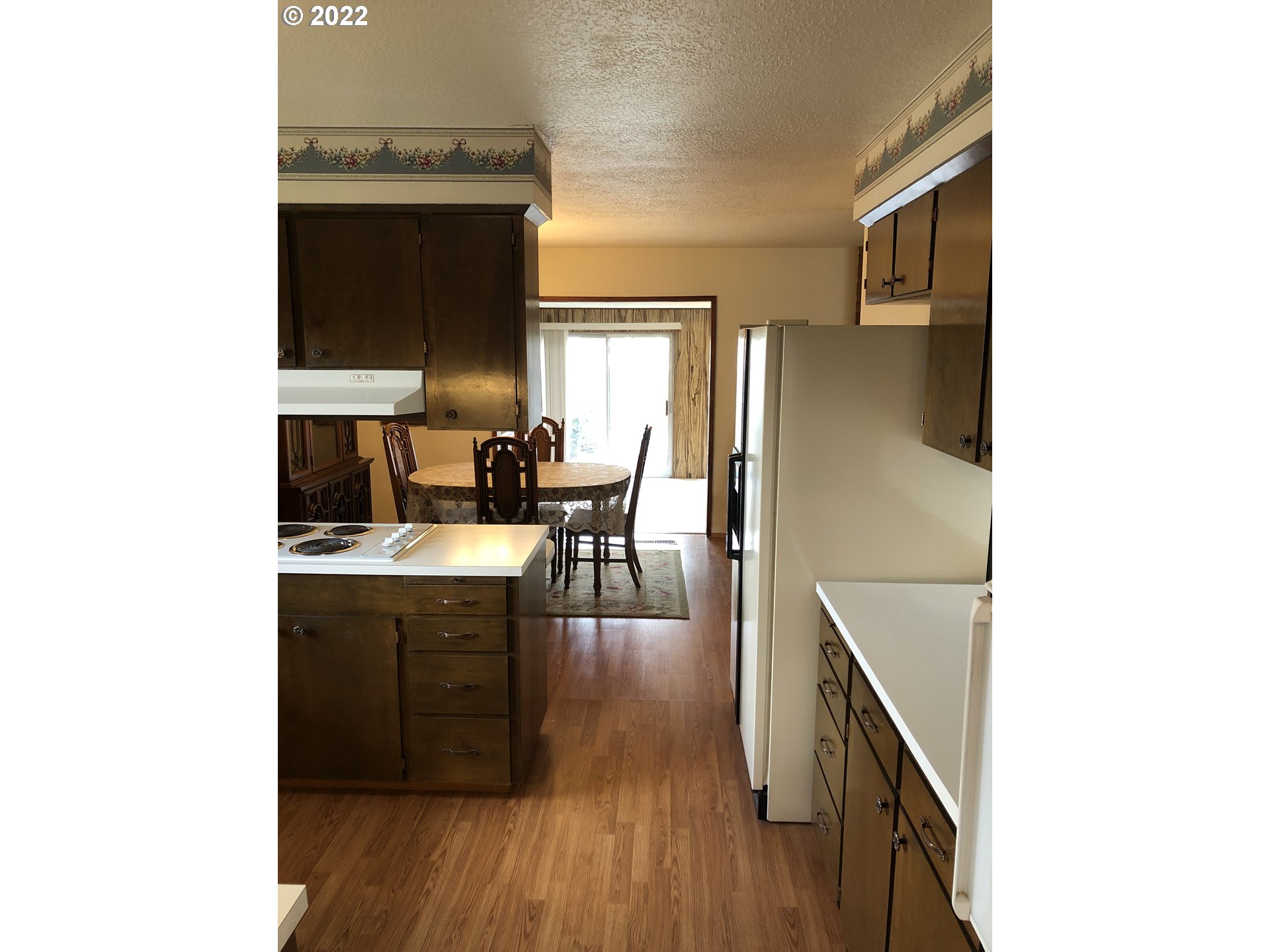 2806 Southwest Goodwin Avenue Pendleton, OR 97801 - Photo 5 of 32 a dining room with table and chairs