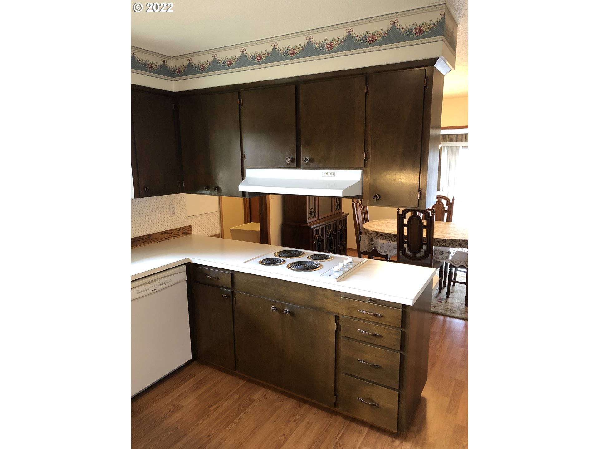 2806 Southwest Goodwin Avenue Pendleton, OR 97801 - Photo 6 of 32 a kitchen with a stove and a refrigerator