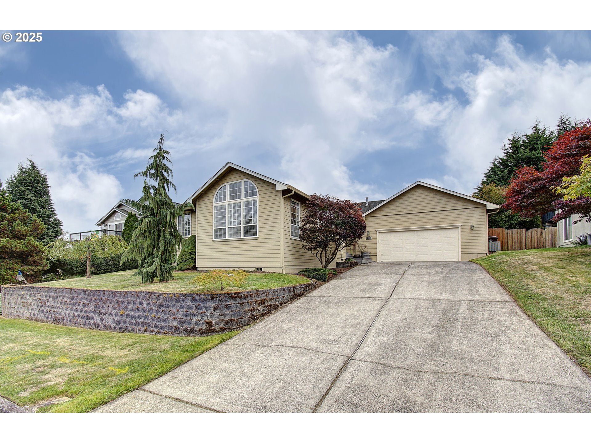 1402 Northwest 30th Avenue Camas, WA 98607 - Photo 1 of 33 a front view of a house with a yard and garage