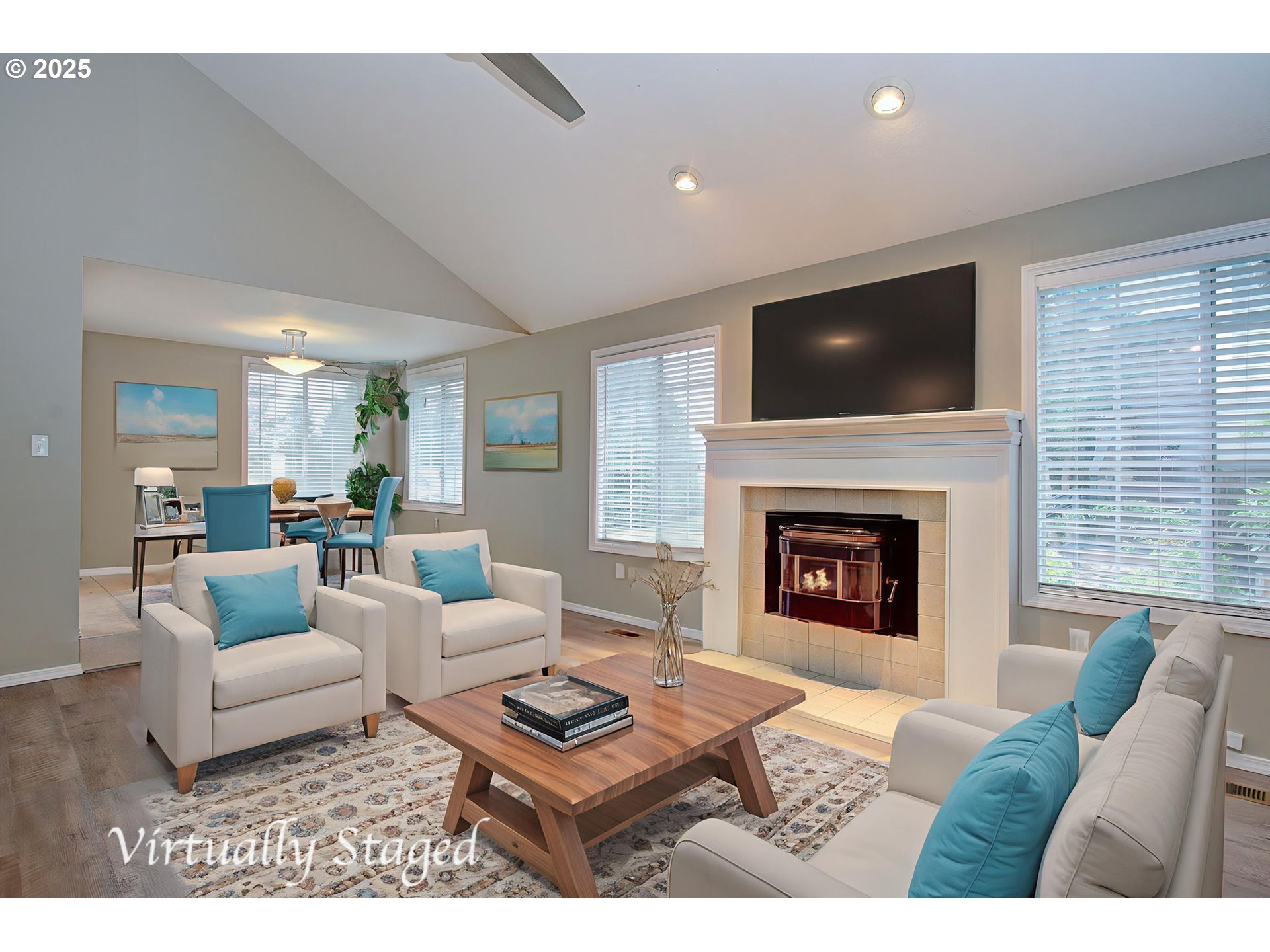 1402 Northwest 30th Avenue Camas, WA 98607 - Photo 15 of 33 a living room with furniture a flat screen tv and a fireplace