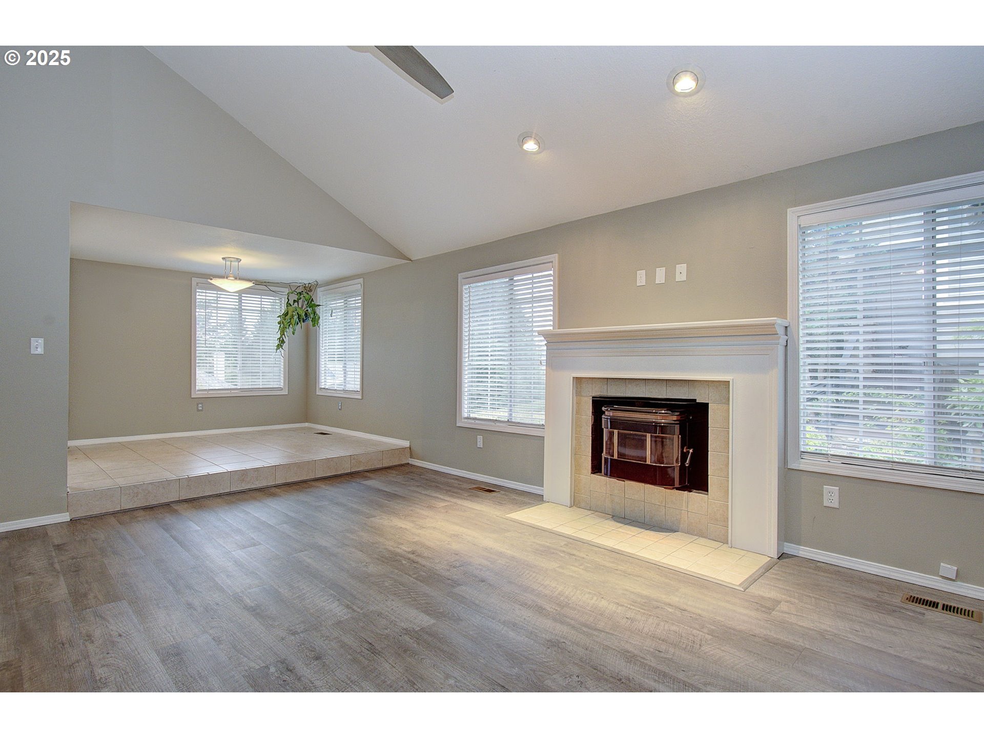 1402 Northwest 30th Avenue Camas, WA 98607 - Photo 16 of 33 a view of an empty room with a window and fireplace