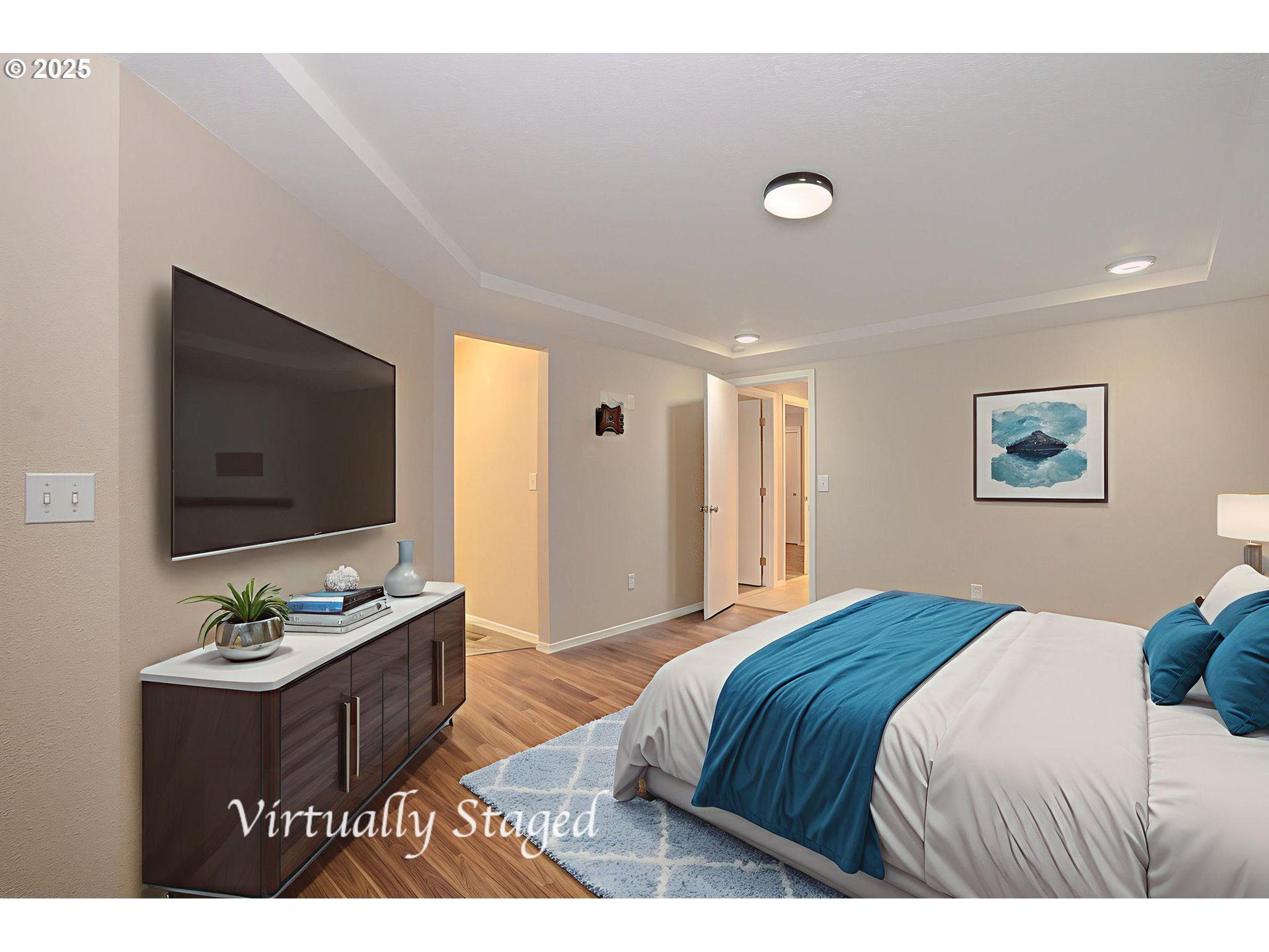 1402 Northwest 30th Avenue Camas, WA 98607 - Photo 20 of 33 a bedroom with a bed and a flat screen tv