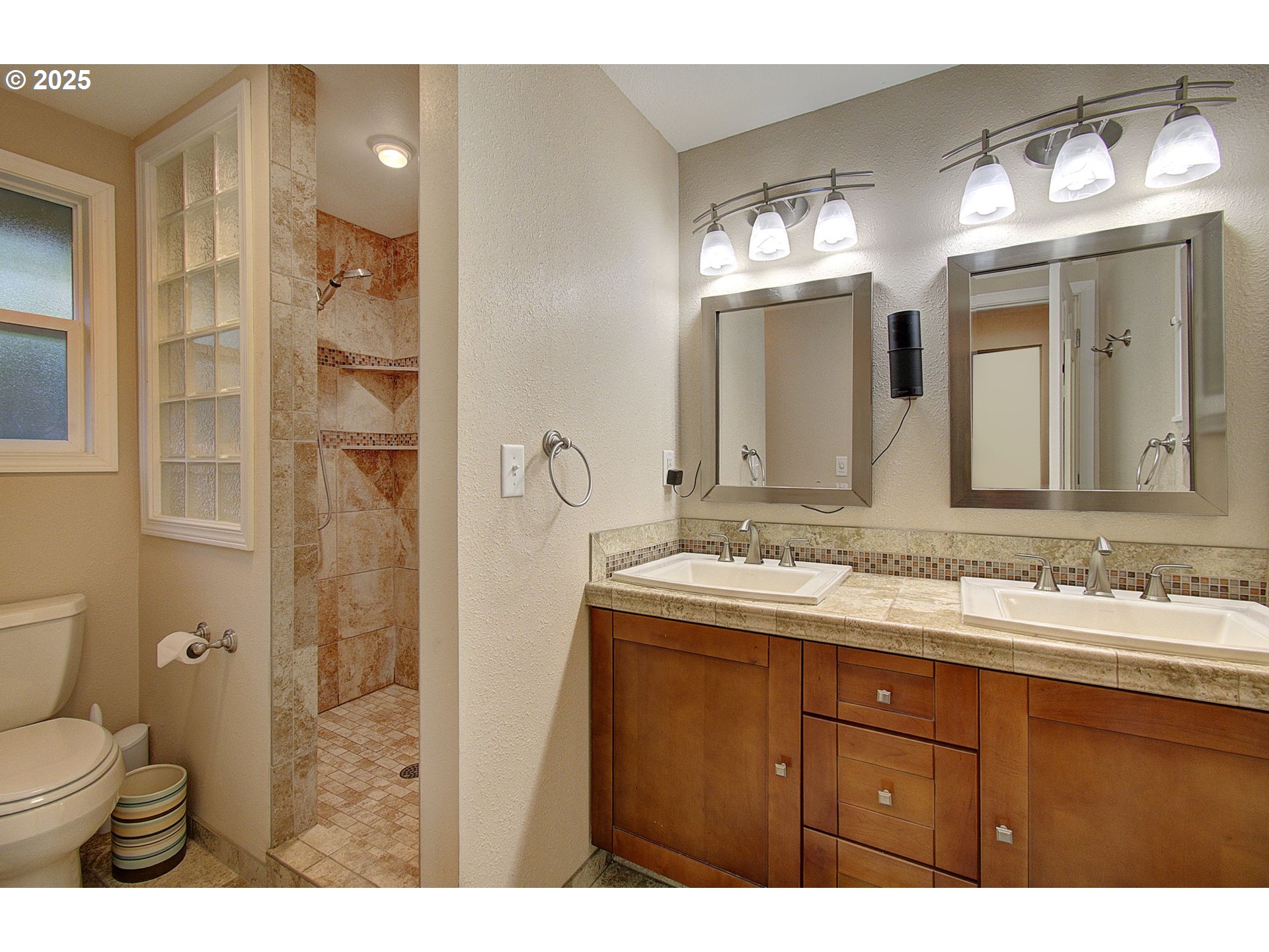 1402 Northwest 30th Avenue Camas, WA 98607 - Photo 24 of 33 a bathroom with a toilet sink and mirror
