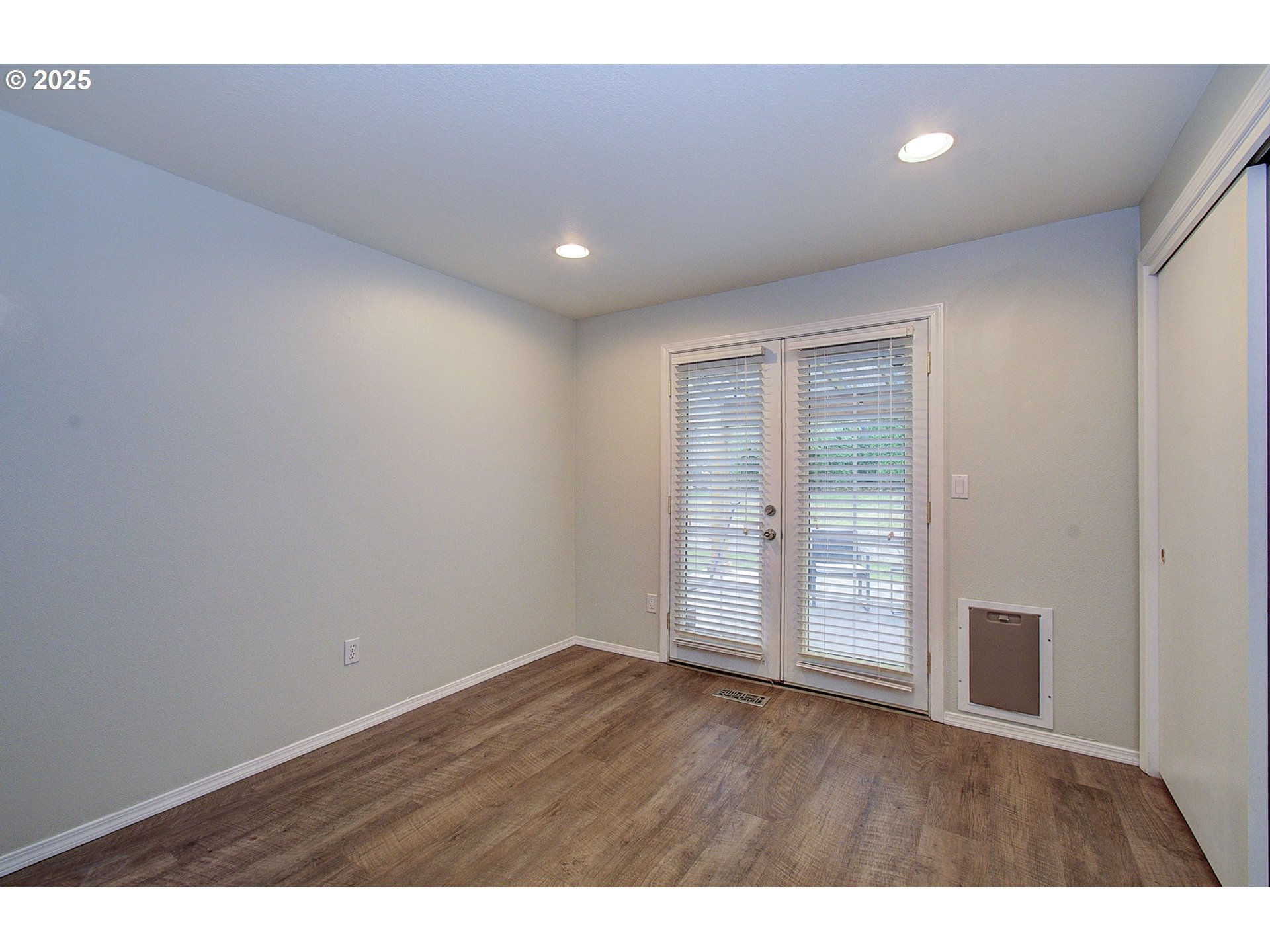 1402 Northwest 30th Avenue Camas, WA 98607 - Photo 27 of 33 a view of an empty room with wooden floor and closet