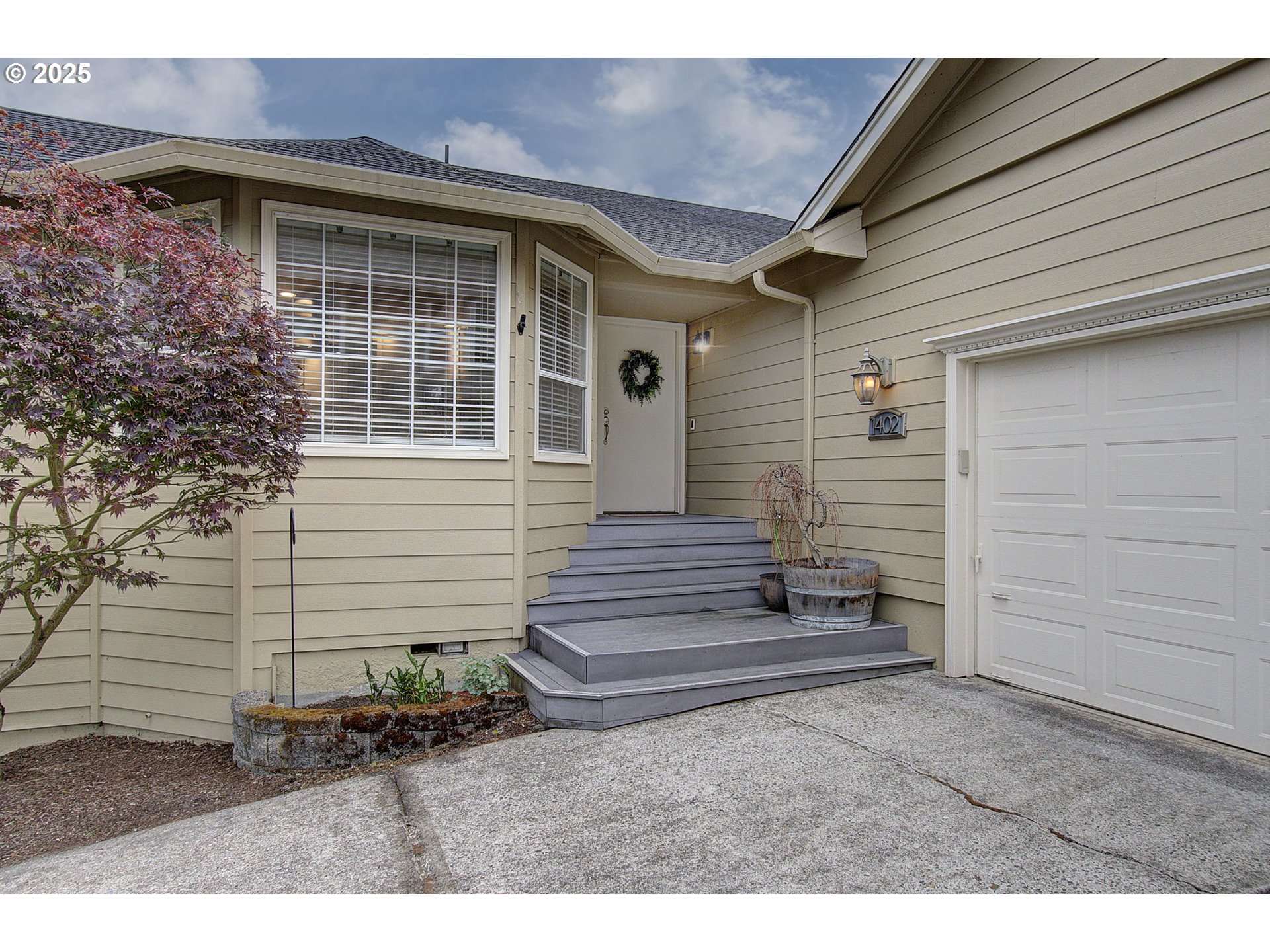 1402 Northwest 30th Avenue Camas, WA 98607 - Photo 4 of 33 a front view of a house with a yard