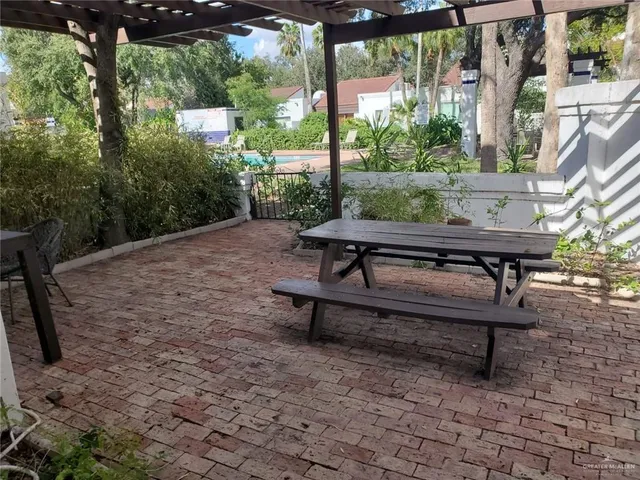 a view of a outdoor sitting area with furniture