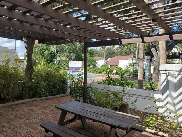 a view of a back yard from a patio