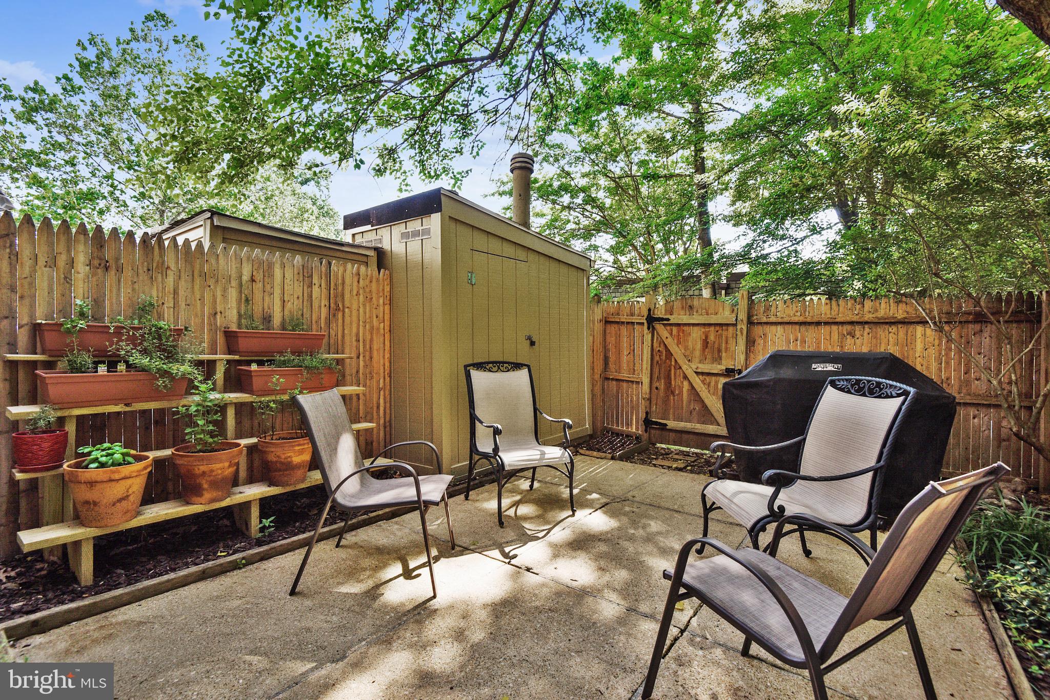 5935 Bayshire Road, Unit 119 Springfield, VA 22152 - Photo 27 of 32 Enjoy entertaining on this cozy patio