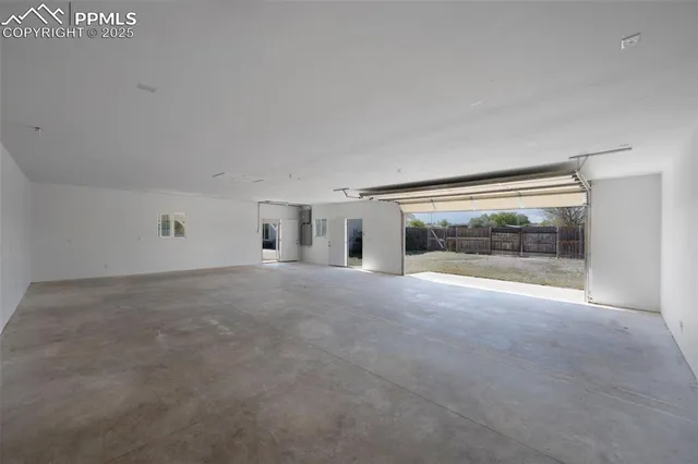 a view of empty room with front door