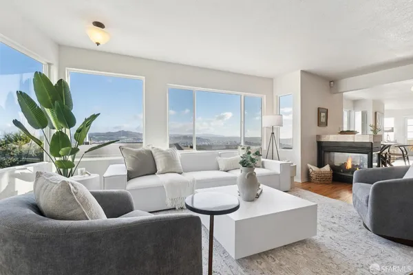 a view of an entryway and livingroom