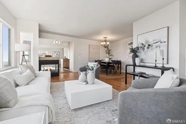a kitchen with stainless steel appliances granite countertop a sink a stove and a microwave oven