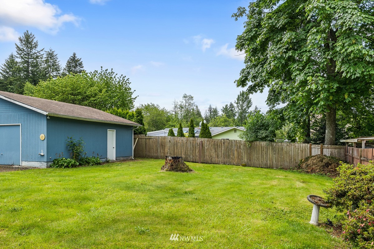 15053 Southeast 113th Street Renton, WA 98059 - Photo 27 of 31 a view of a backyard with a garden