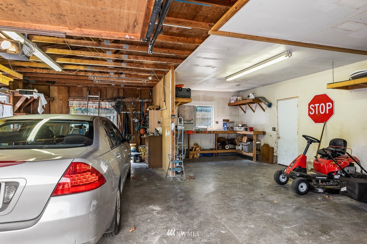 15053 Southeast 113th Street Renton, WA 98059 - Photo 29 of 31 a view of a garage with furniture