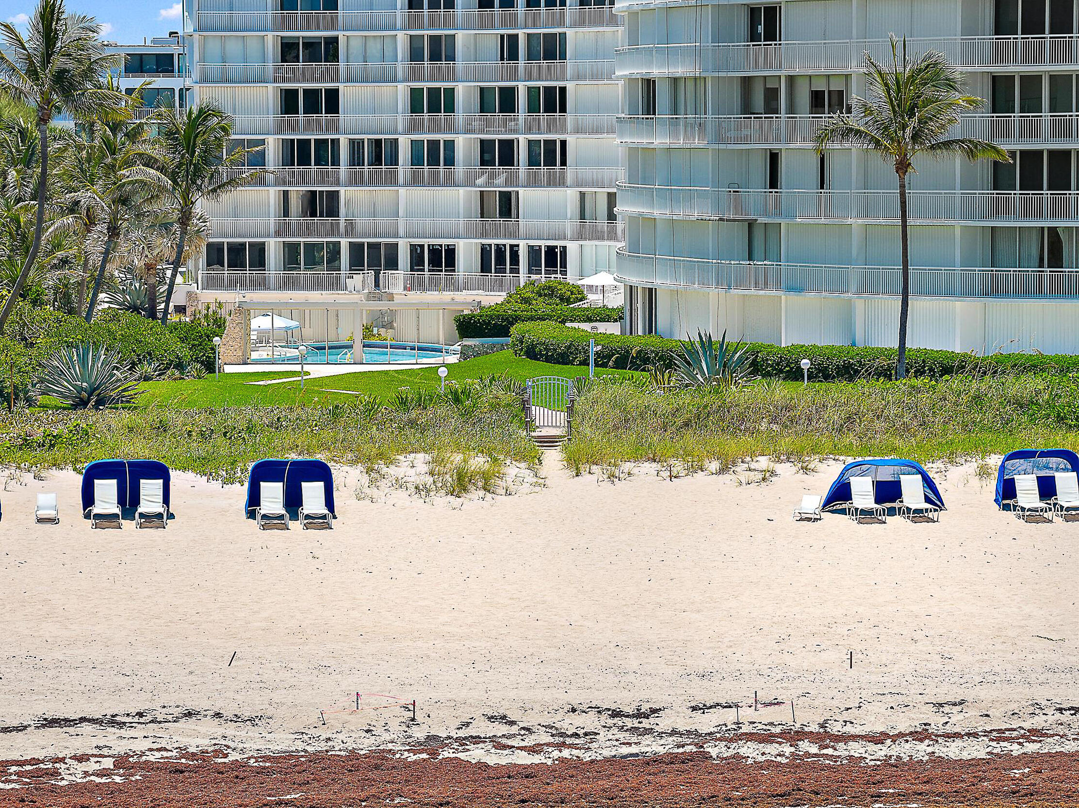 2780 South Ocean Boulevard, Unit 707 Palm Beach, FL 33480 - Photo 23 of 33 front view of house with a yard