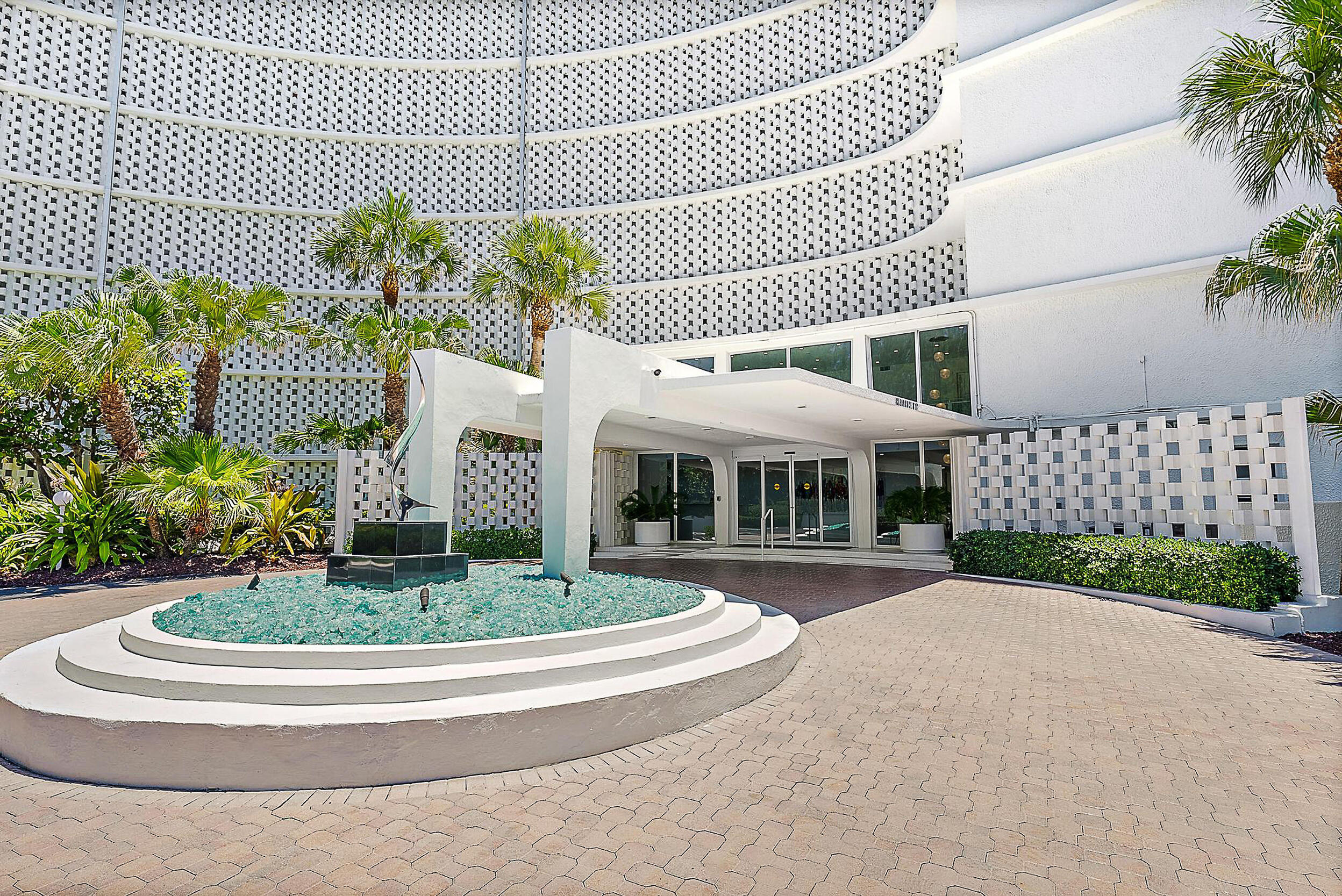 2780 South Ocean Boulevard, Unit 707 Palm Beach, FL 33480 - Photo 28 of 33 a front view of a house with a yard