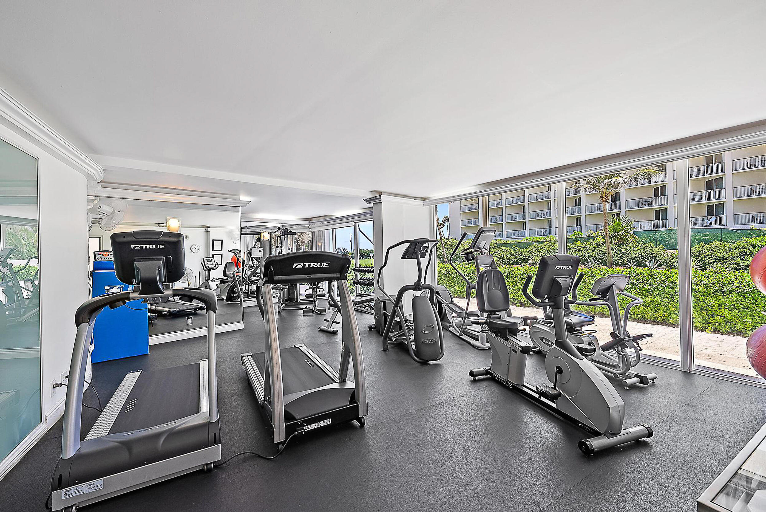 2780 South Ocean Boulevard, Unit 707 Palm Beach, FL 33480 - Photo 31 of 33 a view of a room with gym equipment