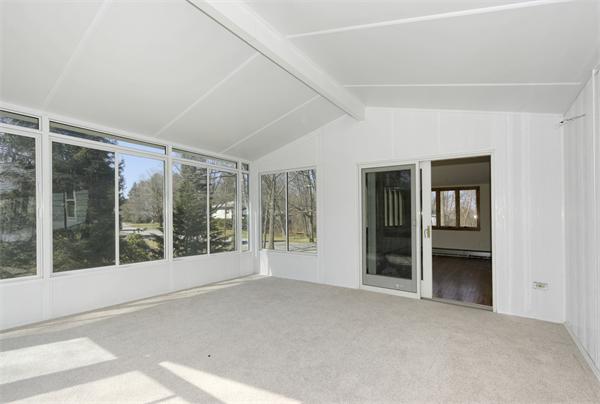 10 Phinney Road Lexington, MA 02421 - Photo 14 of 30 a view of an empty room with glass door