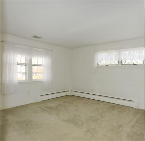 10 Phinney Road Lexington, MA 02421 - Photo 18 of 30 an empty room with a window