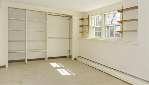 10 Phinney Road Lexington, MA 02421 - Photo 26 of 30 a view of an empty room with a window