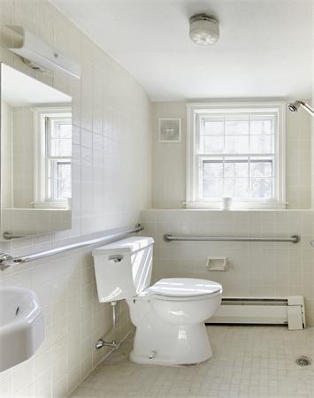 10 Phinney Road Lexington, MA 02421 - Photo 27 of 30 a bathroom with a sink and a toilet