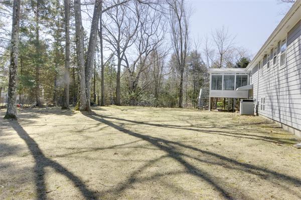 10 Phinney Road Lexington, MA 02421 - Photo 29 of 30 a view of the house with snow on the road
